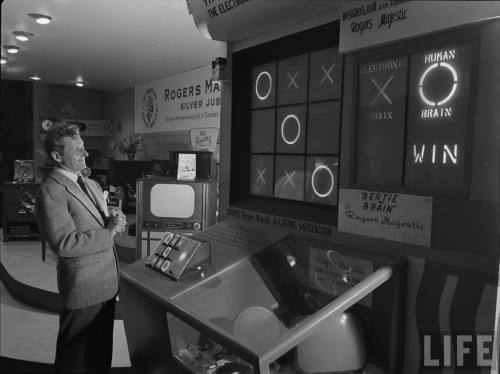 Comedian Danny Kay pleased after "beating" Bertie the Brain during the fair